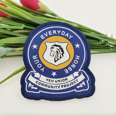 China Custom Cotton Woven Embroidery Patch Badges Sustainable Logo School Apparel Factory for sale