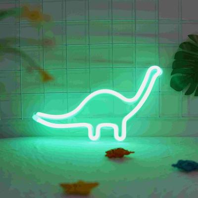 China Convenient Creative Dinosaur Neon Sign LED Night Light USB Charging Socket Wall Lamp for Kids Bedroom Party Decoration Kids Christmas Gifts for sale