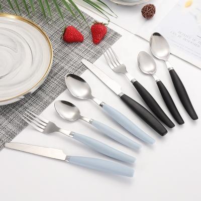 China New Design 4PCS Disposable Stainless Steel Metal Metal Fork Spoon Knife Plastic Handle Disposable Flatware Set for sale