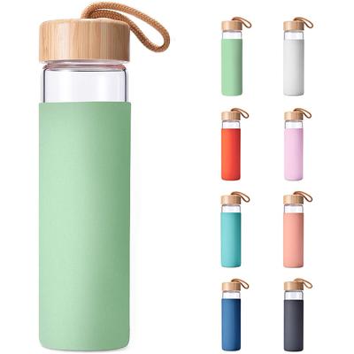 China Custom Logo BPA Free Bamboo Lid Glass Drinking Water Bottle With Silicone Sleeve for sale