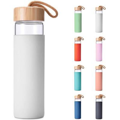 China Sustainable Ready To Ship Glass Water Bottle With Borosilicate Glass Lid Protective Silicone And Bamboo Sleeve Water Bottle for sale