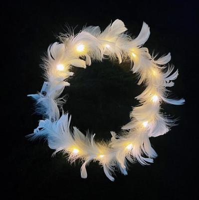 China Party Decoration New Arrival Christmas Wedding Suppliers Light Up Fancy Feather Headbands for sale