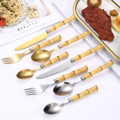 China Sustainable Custom Classic Plastic Bamboo Handle 4 Pieces Flatware Set Stainless Steel Silverware for sale