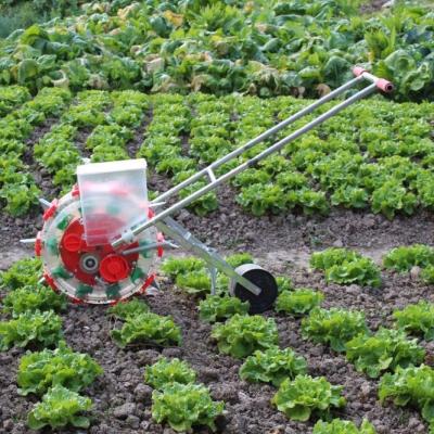 China Seed Planting Machine Small Hand Held Household Planting Corn, Soybean And Cotton Seeder For Farm Planting for sale