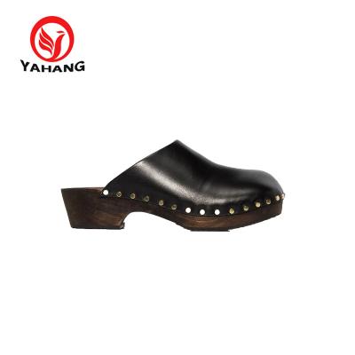 China Curvy Women Solid Wood Sole Leather Upper Clog Slip On Wedge Heel Leather Shoe for sale