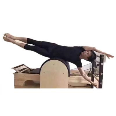 China Hot Selling Wooden Studio Pilates Ladder Arch Barrel Pilates Barrel Pilates Chair for sale