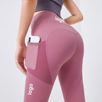 China 2022 Breathable Wholesale Abdomen Woman Fitness Gym Lift Up Butt Lift Waist Yoga Gaiters Pants With Reticulated Mesh Pockets for sale