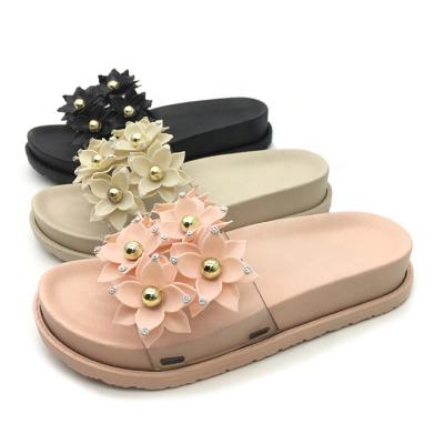 China Latest Design Camellias Flowers Waterproof Summer Beach Flat Slippers Ladies Slippers for sale