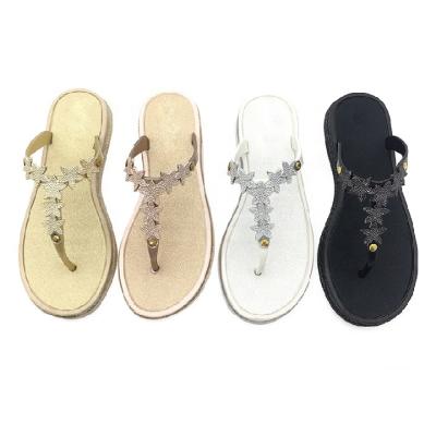 China Fashion Trend Low Price Factory Price Summer Home Outdoor Shoes Single Flat Regular Waling Slides Flower T Flip Flops With Metal Star Decoration for sale