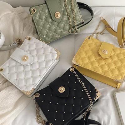 China 2021 Fashion Fashion Logo Rivet Single Shoulder Chain Custom Wholesale Small Square Bag Cross - Body Bag for sale