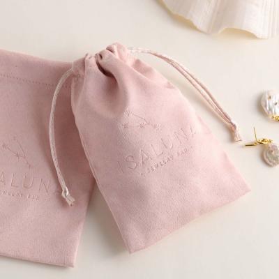 China Luxury Drawstring Bag Jewelry Pouch PandaSew Logo Deboss Print Pink Suede Luxury Custom Jewelry Bag for sale