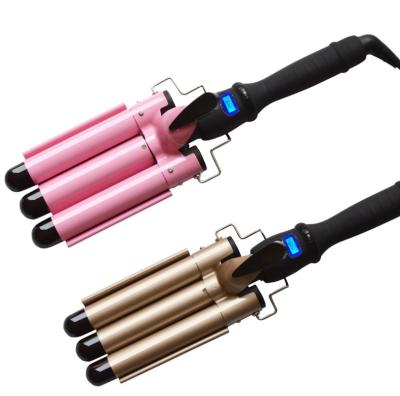 中国 Professional Magic Hair Curler LCD Temperature Display and PTC Heater Triple Barrel Hair Curler Iron 販売のため