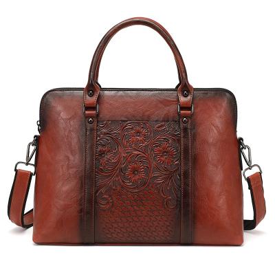 China 2022 OEM Retro Vegan Leather Bags PU Leather Luxury Briefcases Office Bags Laptop Bag For Retro Women Handbags With Emboss Flowers for sale