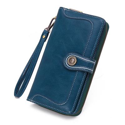 China Custom RFID Oil Wax Vegan Leather Coin Clips RFID Protective Women Designer Wallet Retro Multi Card Wallets Long for sale