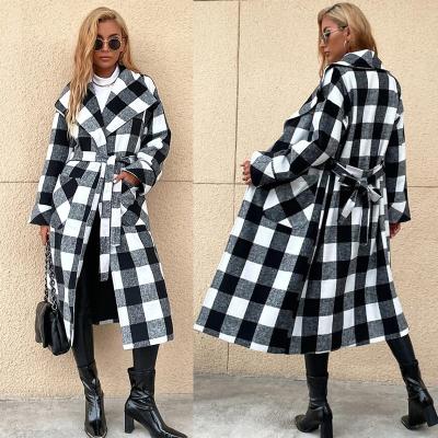 China 2021 Winter New Ladies Anti-wrinkle Long Plaid Jacket Lapel Black And White Belt Long Sleeve Warm Coat for sale