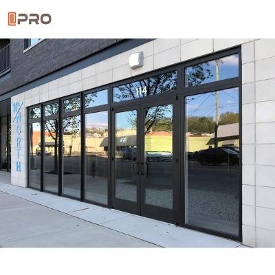 China Entrada exterior con bisagras de cristal de aluminio comercial Front Doors de la tienda de las puertas en venta