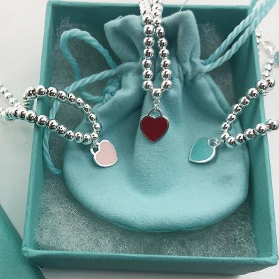 China Other Love S925 Heart Shaped Heart Bangle Blue Pink Beads Simple Soft Enamel Peach Heart Bangle Manufacturer Direct for sale