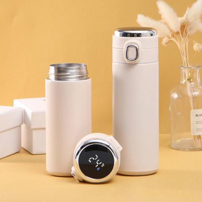 Cina 2021 PORTABLE New Design Customized Mugs With Cup 304 Stainless Steel Cute Innovative Vacum Flask Mini Water Bottle in vendita