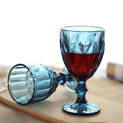 China Modern Wholesale Colored Glassware Colored Goblet Wine Glasses Water Glass Vintage Pressed Blue Glass Goblets Te koop