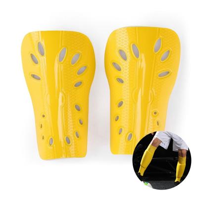 China Protective Shutter 16 Fixed Sleeve Men's Calf Insert Plate Leg Protection Shutter Kids Football Protectors for sale