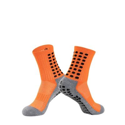 China Regular Custom Long Tube Dot Glue Non-Slip Absorbent Sweat Breathable Competition Style Professional Sports Socks for sale