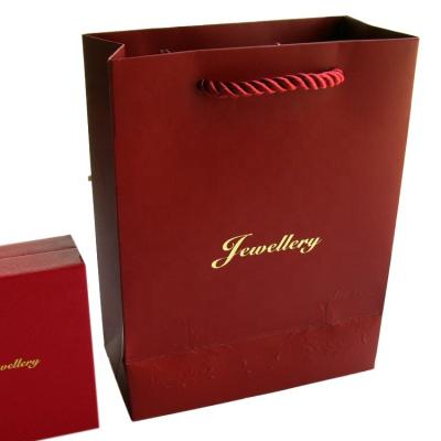 China Newest Logo Luxury Small Christmas Gift Custom Paper Bags Gift Shopping Packaging Bag With Handles for sale