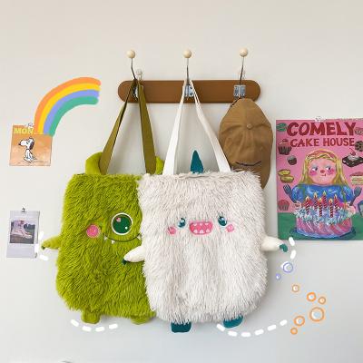 China Fashion College Style Personality Monster Plush Fur Small Handbag Cute Ugly Funny Girls Tote Bag for sale