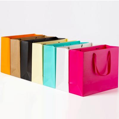 China Custom Luxury Recycled Materials Logo Reusable Gift Bag Handbag Shopping Bags With Logos for sale