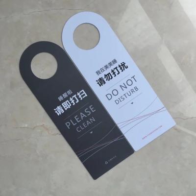 China Custom Adjustable Plastic Club Factory Price Hotel Do Not Touch PVC Door Hanger for sale