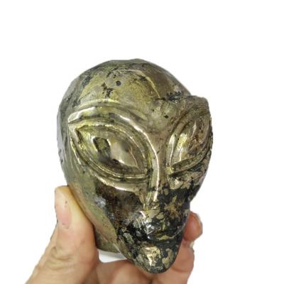 China China wholesale natural pyrite stone hand carved crystal aliens skulls for craft for sale