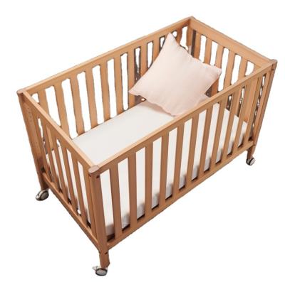 China Modern Simple And Modern Crib Bedside Solid Wood Newborn Bed for sale