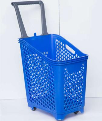 China Eco-friendly large capacity plastic shopping basket with wheels for sale