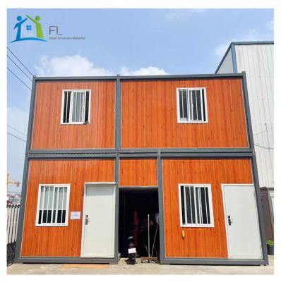 China Low Cost Wood Sandwich Panel Modern Grain Ventilated Apartment Pack Prefab Modular Homes Container Houses For Living Shop Porter for sale