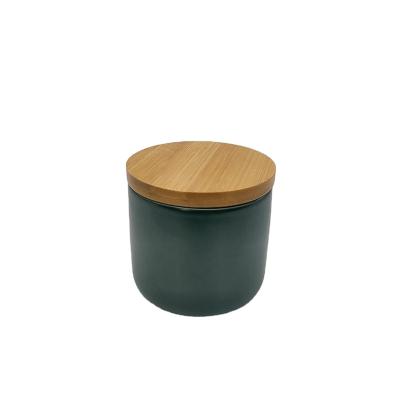 China Scented Manufacture Matte Green Ceramic Jar Soy Wax Scented Candle for Home Decoration and Air Freshen for sale