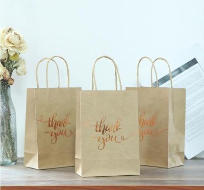 China 50pcs Recyclable Custom Logo Printed Promotional Eco Brown Paper Bag Gift Wrapping Bags For Shopping for sale