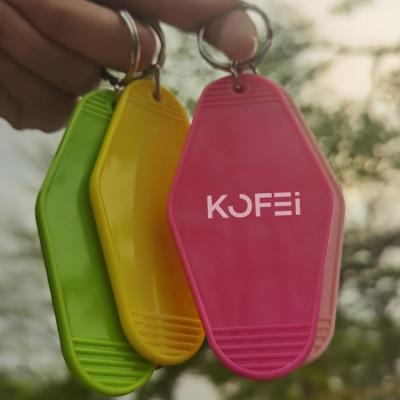 China Durable Wholesale Kofei Custom Your Own Retro Design Logo Key Chain Promotional White Vintage Motel Key Tag Plastic Key Chain for sale