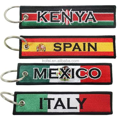 China Goods Kofei Customized Embroidery Key Chain With Promotional Fashion Woven Fabric Custom Logo Key Flag Key Chain for sale