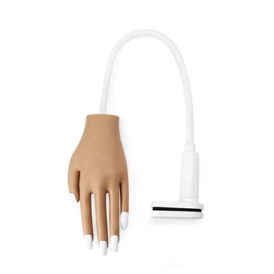 China Brown Silicone Long Lasting Manicure Training Artificial Prosthetic Hand For Nail Art for sale