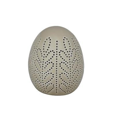 China Europe Easter Decorative Ceramic Rabbit Egg With Led Light Rabbit Egg For Home Decor for sale