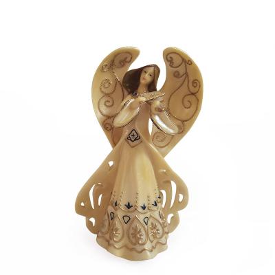 China Europe Custom Resin Angel And Cross Crafts Polyresin Family Statue Religious Figure For Sale for sale