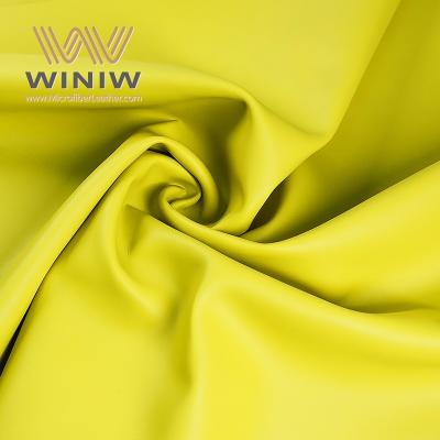 China 1.2mm Yellow Micro Fiber Synthetic Leather Car Seat Fabrics Automotive Leather for sale