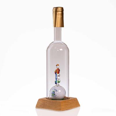 China New Arrival OEM & ODM Fashion Wine Soft Stopper Bottle Bourbon Gold Golfer Plated Goblet Housewarming Decanter for sale