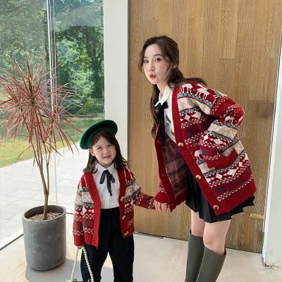 China Viable Factory Wholesale Autumn Women's Jacquard Knit Sweater Women And Girl Size Art Graffiti Christmas Outfit For Family Cardigan for sale