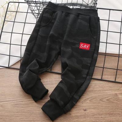 China 2021 children's anti-pilling pants spring and autumn new children's casual models camouflage baby male pants for sale