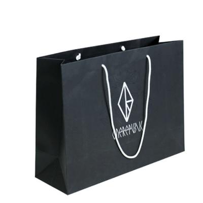 China Custom Logo Luxury Paperbag Boutique Retail Materials Clothing Shopping Bag Recycled Packaging Paper Bag With Logo for sale