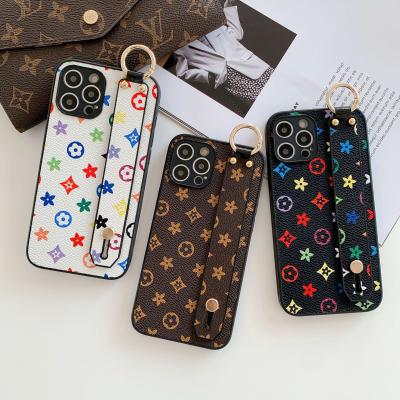 China Phone Shockproof Stand Band Wrist Leather Leather Case for iphone 13 handybrite shockproof stand 12 11 mini 8plus back cover for sale