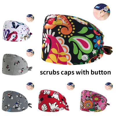 China Fashionable cotton cartoon printing sweat-absorbent elastic scrub hat beauty salon working hats pet shop spa men and women scrub hats wholesale for sale