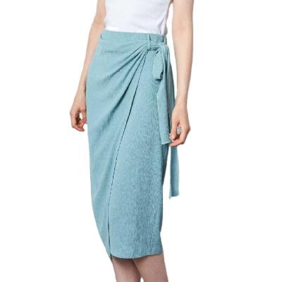 China Viable elastic waistband corrugated 2021 stylish Korean wrap skater ruffle half skater pencil skirt women with tie sides for sale