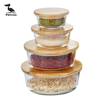 China 1040ml Meal Prep Microwavable Eco Friendly Glass Storage Container With Lid Glass Storage Bamboo Vented Food Container for sale