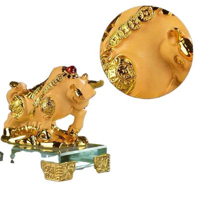 China Worlwide Chinese Zodiac Sculpture Glass Base Home Office Table Decor Figurine Gift Resin Frosted Golden Ox/Bull Feng Shui Zodiac Statue for sale